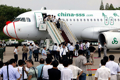 Китайская авиакомпания вводит в самолетах стоячие места