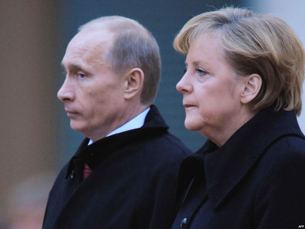Меркель и Путин уже обговорили проведение выборов на Донбассе. И не только