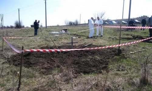 На Донбассе обнаружено захоронение с 18 телами. ФОТО