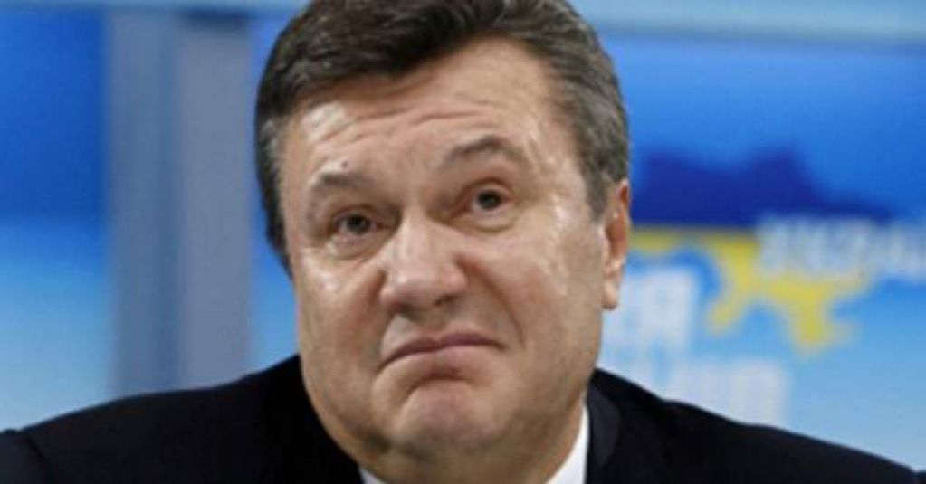 Рядом с Медведевым: Януковича засекли на матче Россия - Испания