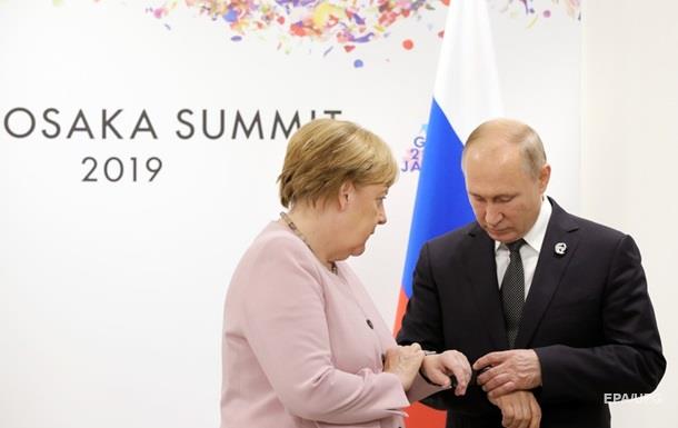 Меркель подняла вопрос минских соглашений на встрече с Путиным