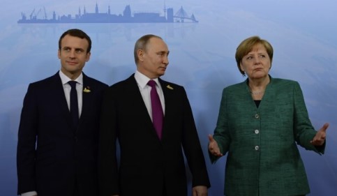 "Забыть о Крыме в обмен на...": появились детали тайных переговоров Путина с Меркель и Макроном