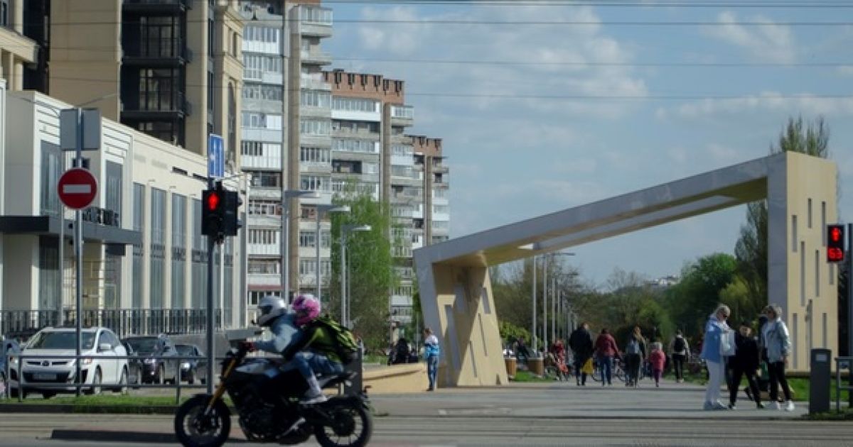 город