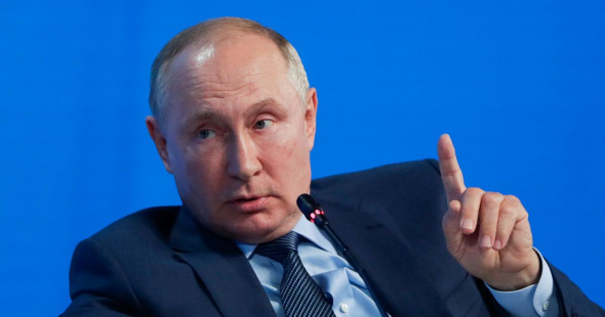 Путин