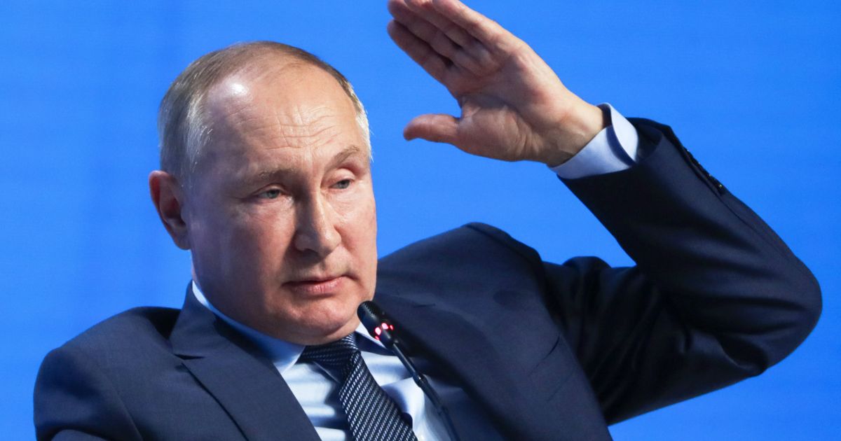 Путин