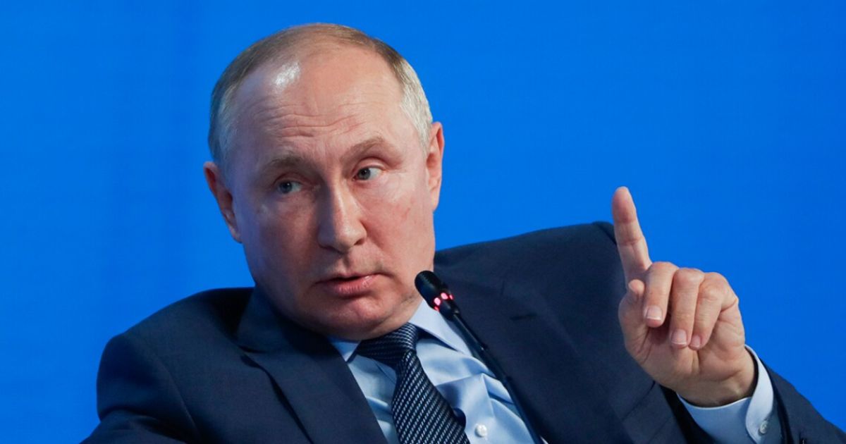 Путин