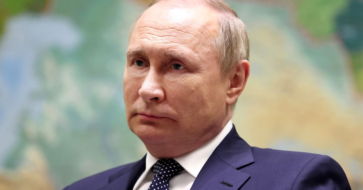 Путин