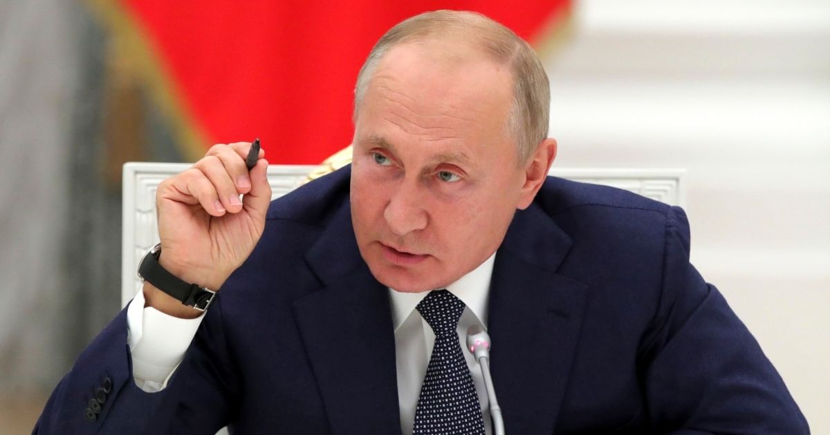 Путин