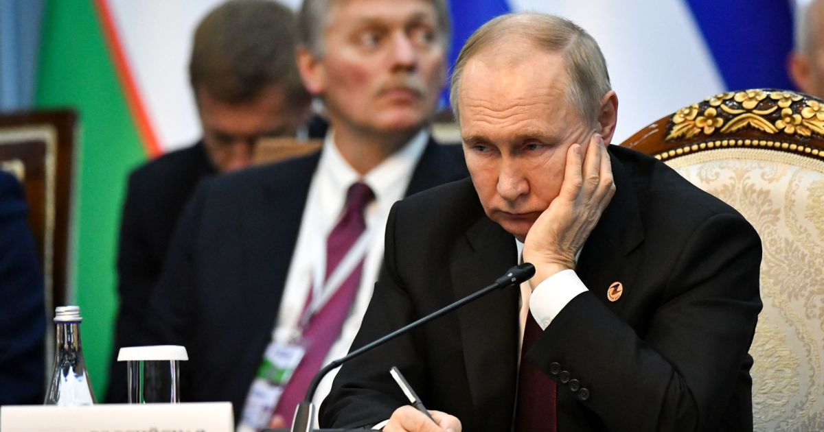 Путин