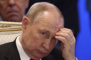 Путин