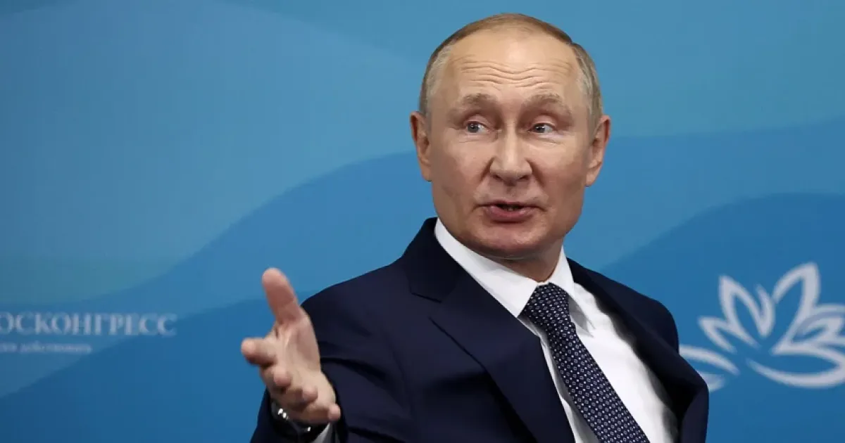 Путин