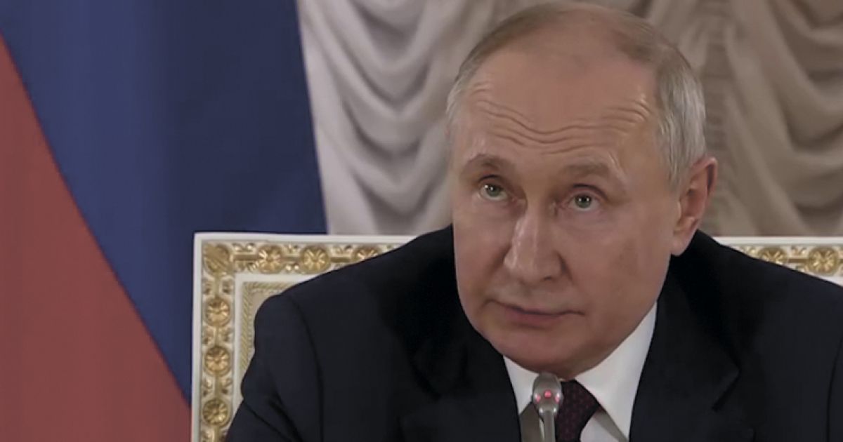Путин