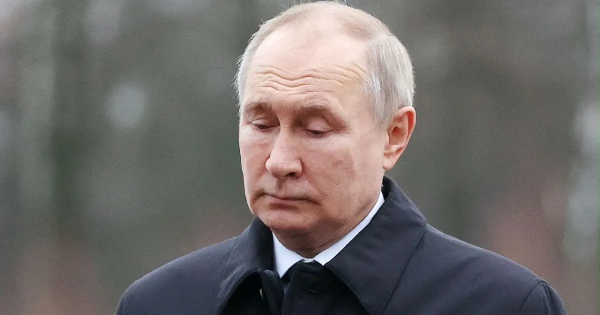 Путин