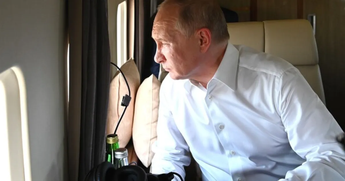 Путин