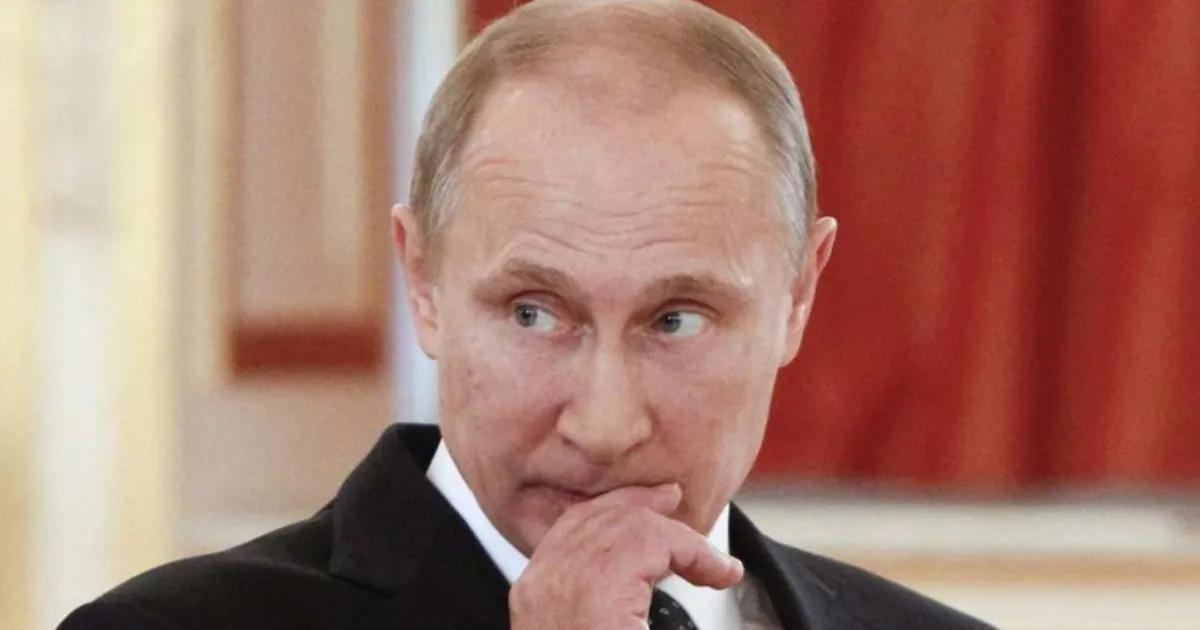 Путин