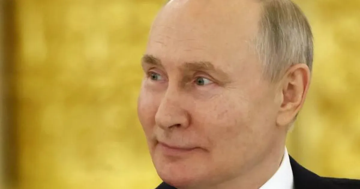 Путин