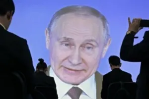 Путин