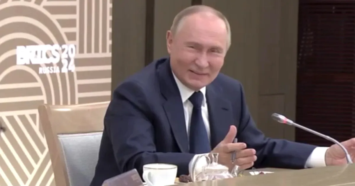 Путин