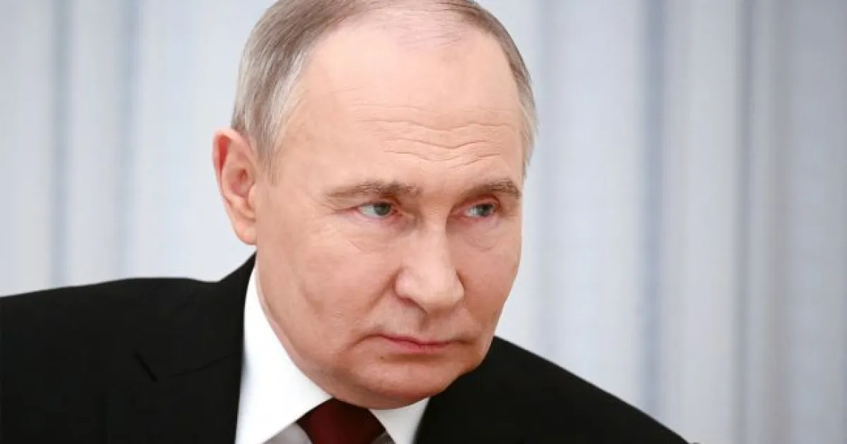 путін