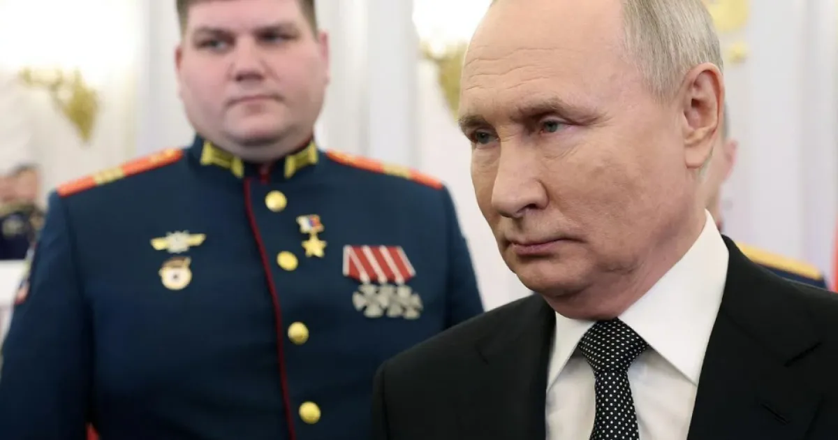 Путин