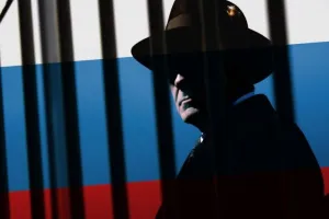 шпион