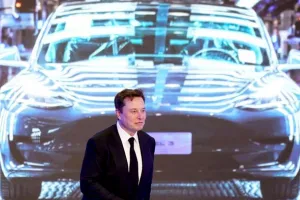 Маск,Tesla