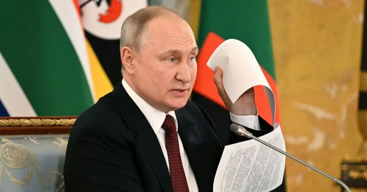 Путин