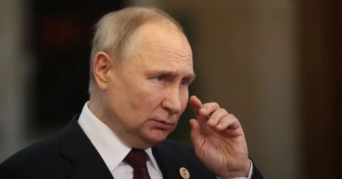 Путин