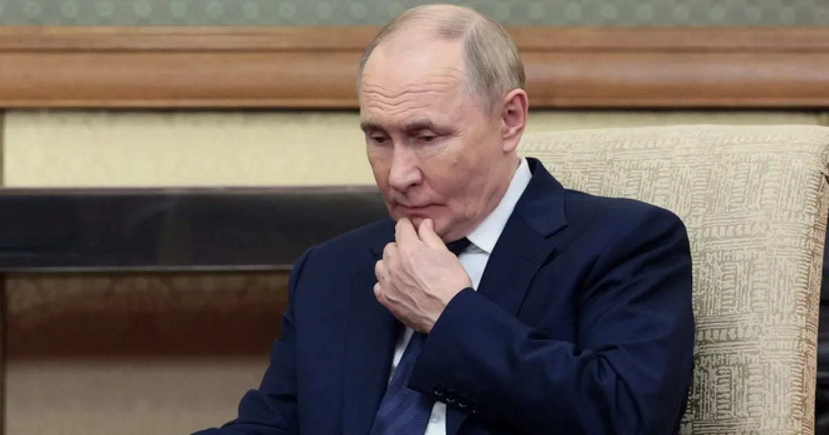 Путин