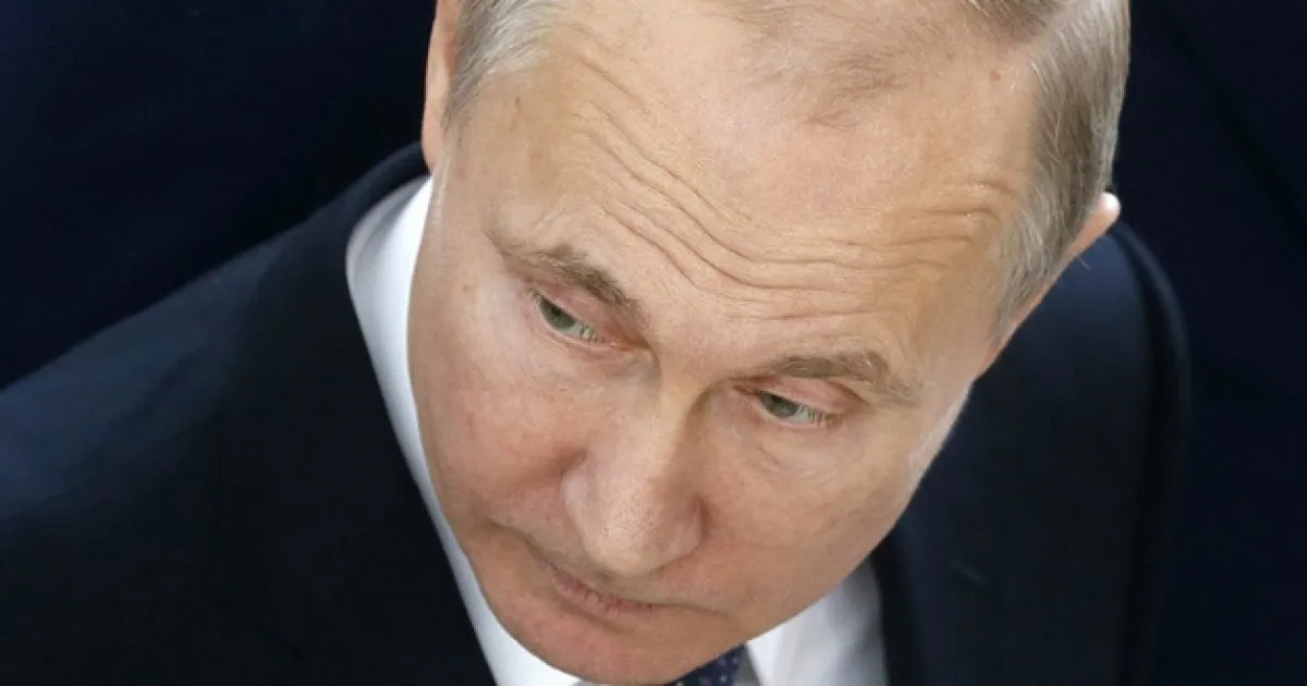 Путин