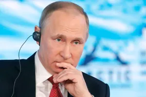 Путин