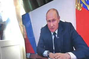 Путин