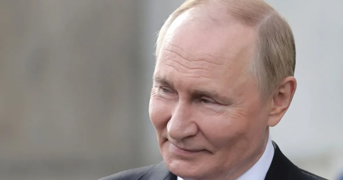 Путин