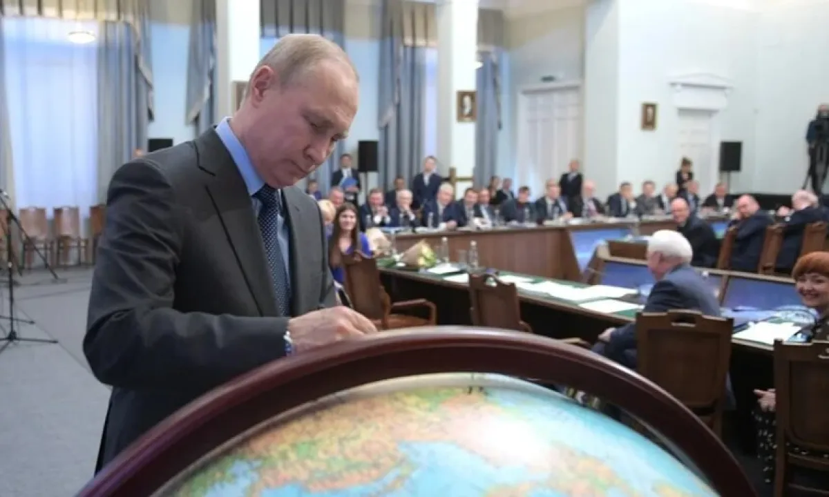 Путин
