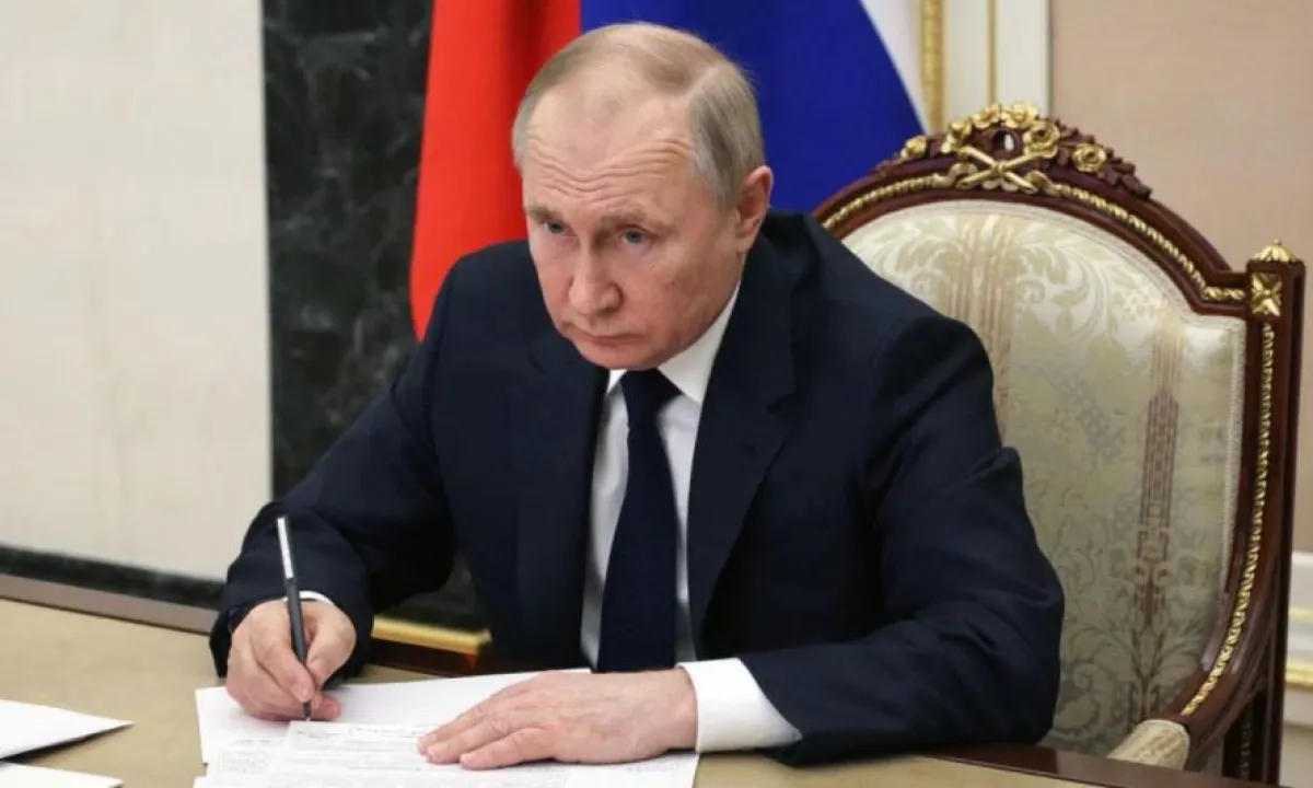 Путин