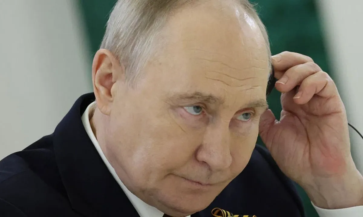 Путін
