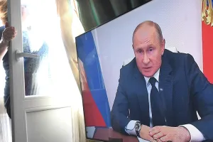 Путин
