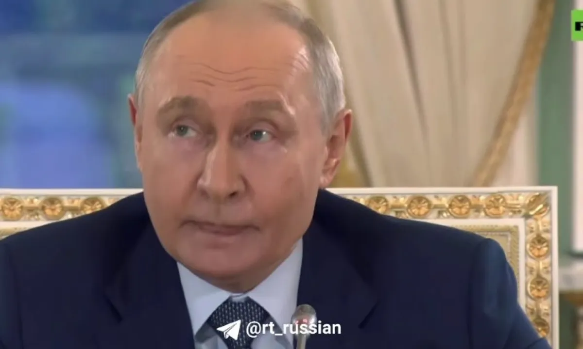 Путин