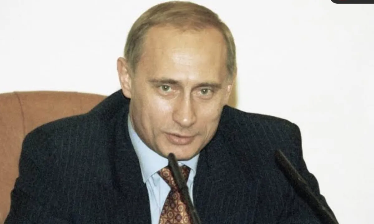 Путин