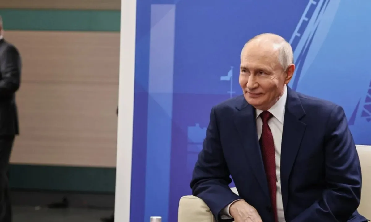 Путин