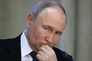 Путин