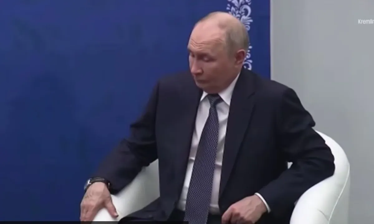 Путин